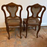 Pair of Louis XV style chairs in wood and caning.