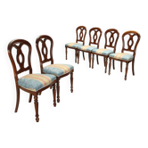 Antique walnut chairs with curved legs, Italy, mid-19th century.