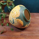 Ceramic ball vase with yellow and green leaf patterns