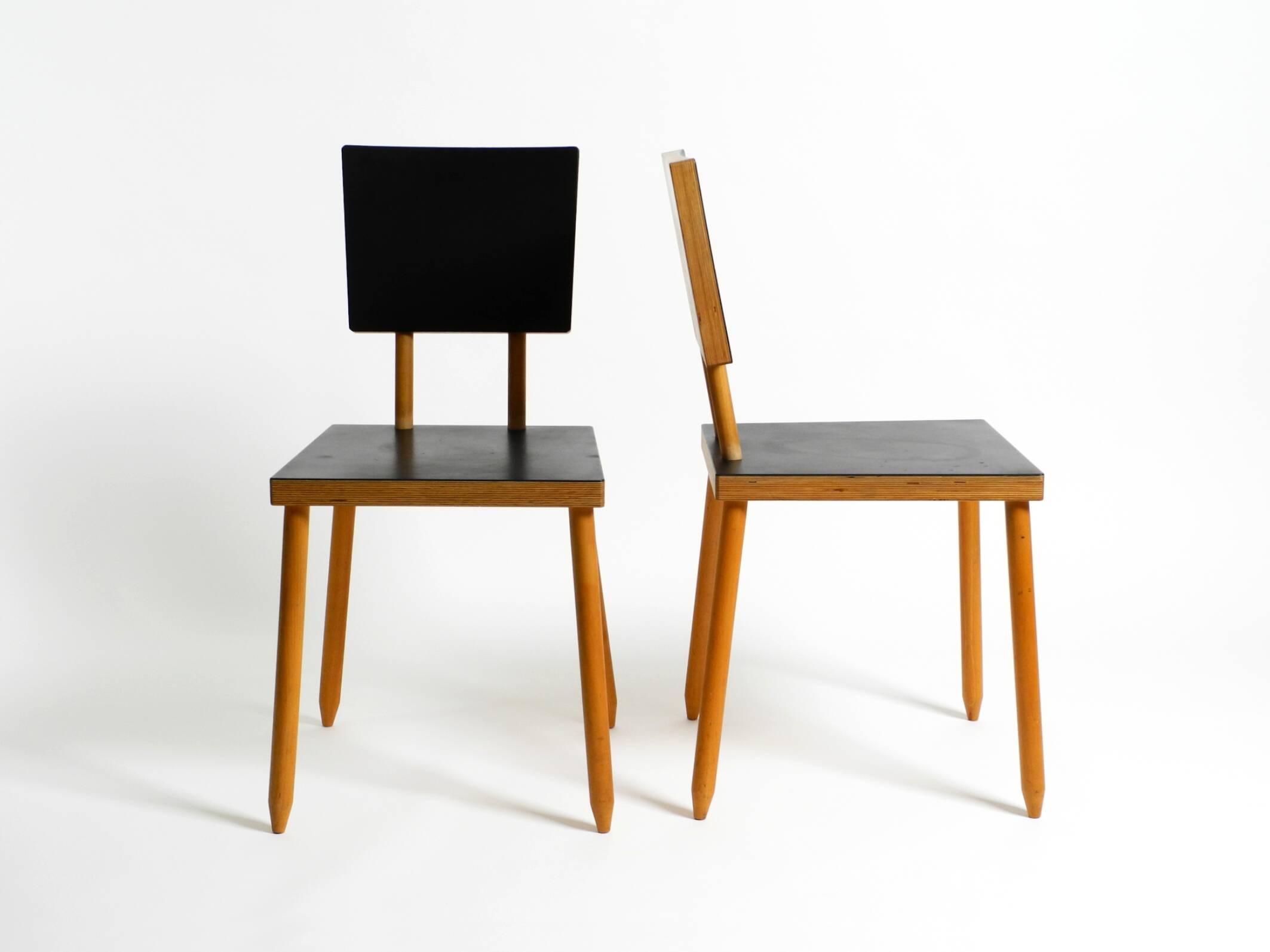 Two rare demountable plywood chairs by Axel Kufus model Stöcke for Atoll