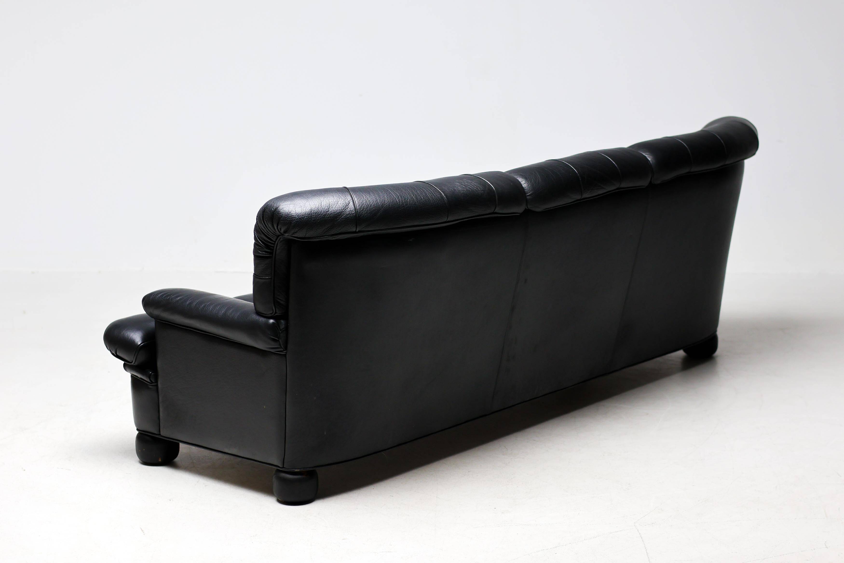 Three-seater sofa "Jupiter" in black leather by Arne Norell, Sweden, 1960.