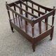 Vintage 19th-century Canterbury magazine rack made of solid wood.