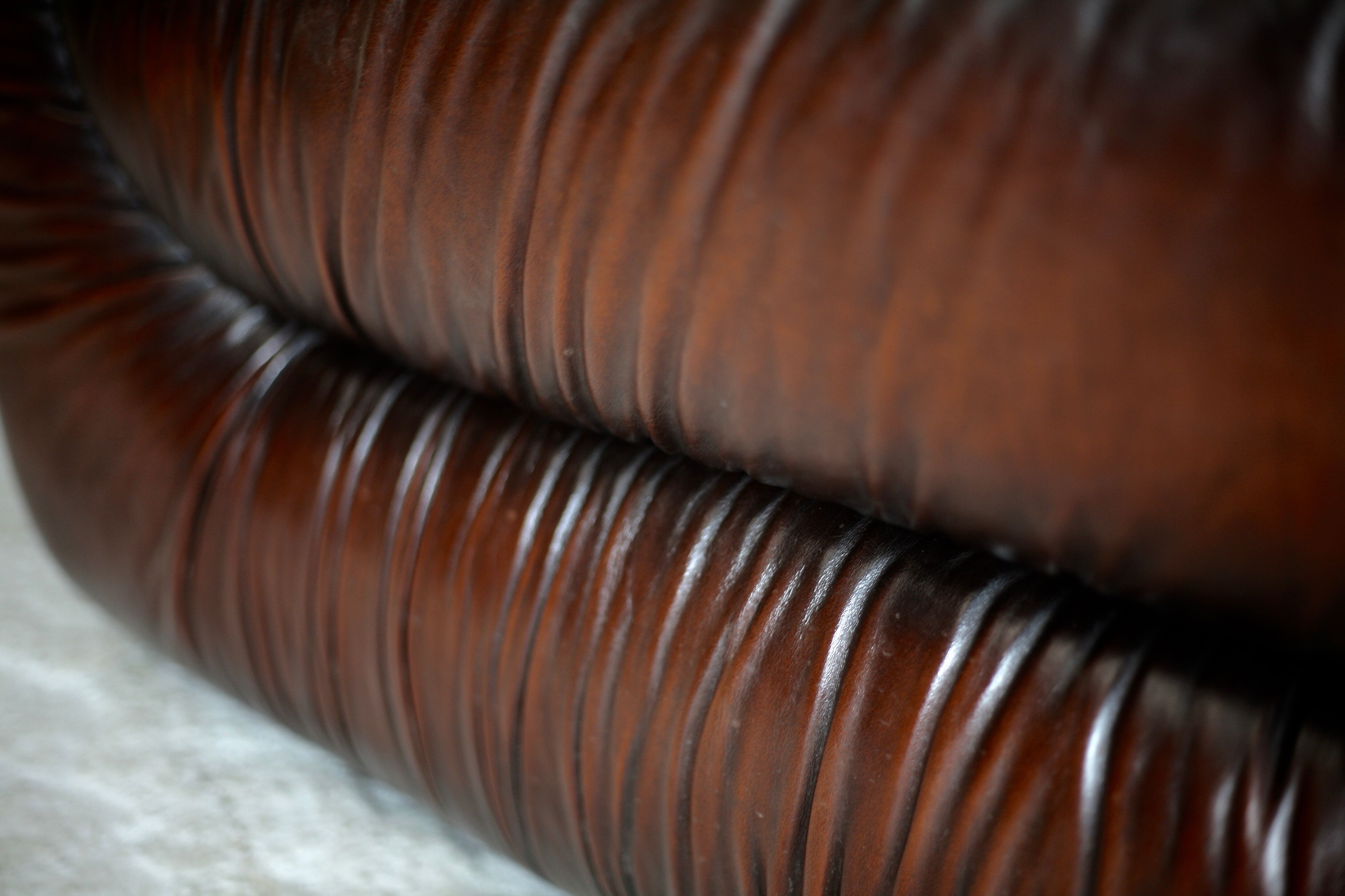 Leather armchair and coffee table set, Italy, circa 1970. Space Age