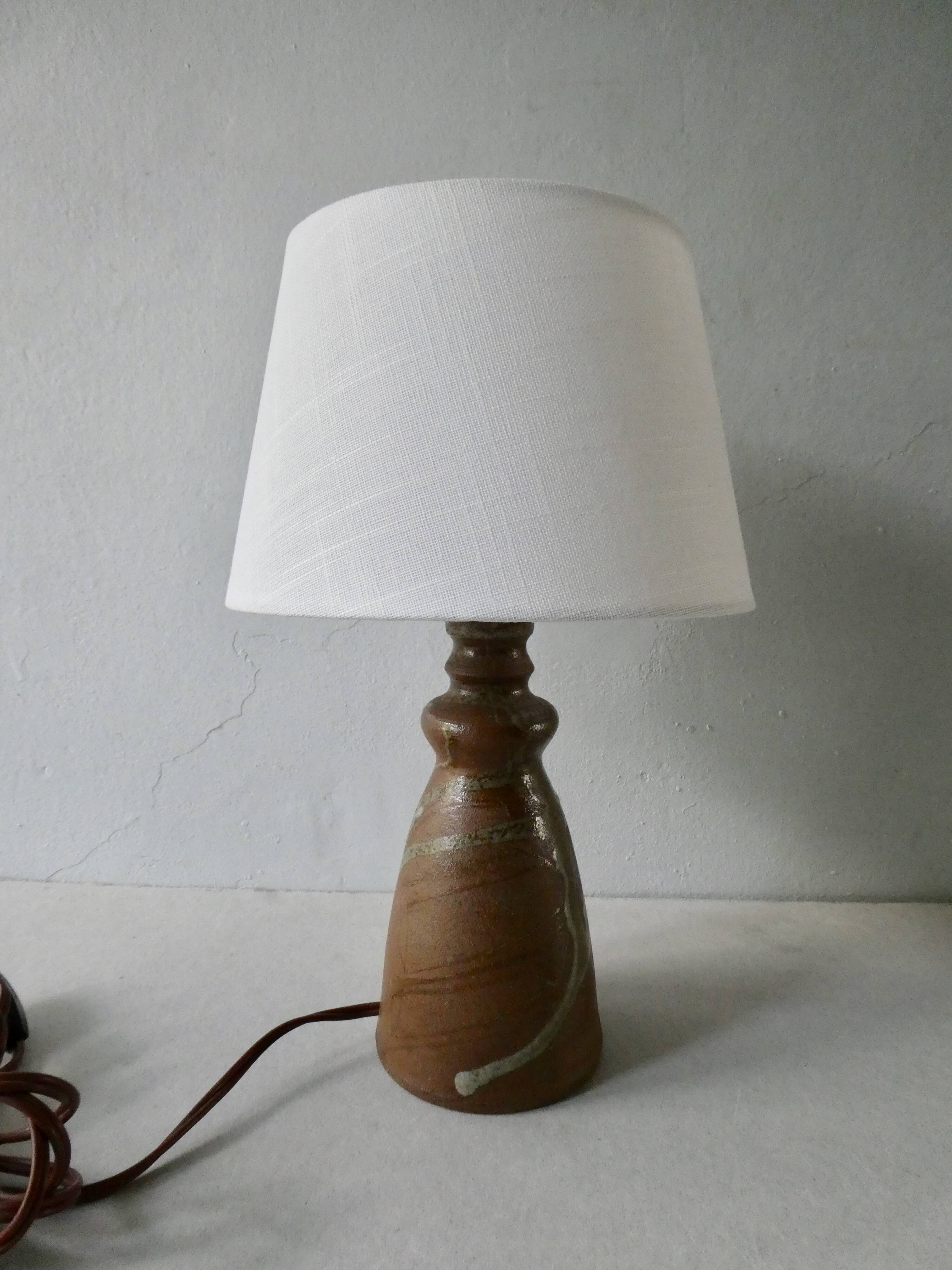 Sandstone lamp, signed, 60s