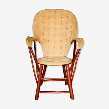Vintage chestnut armchair and burlap