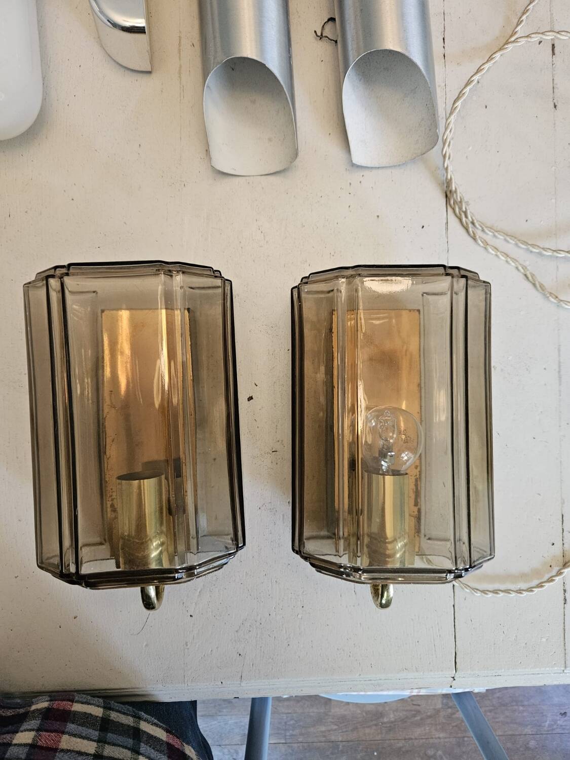 Pair of glass and brass wall lights, 1960s.