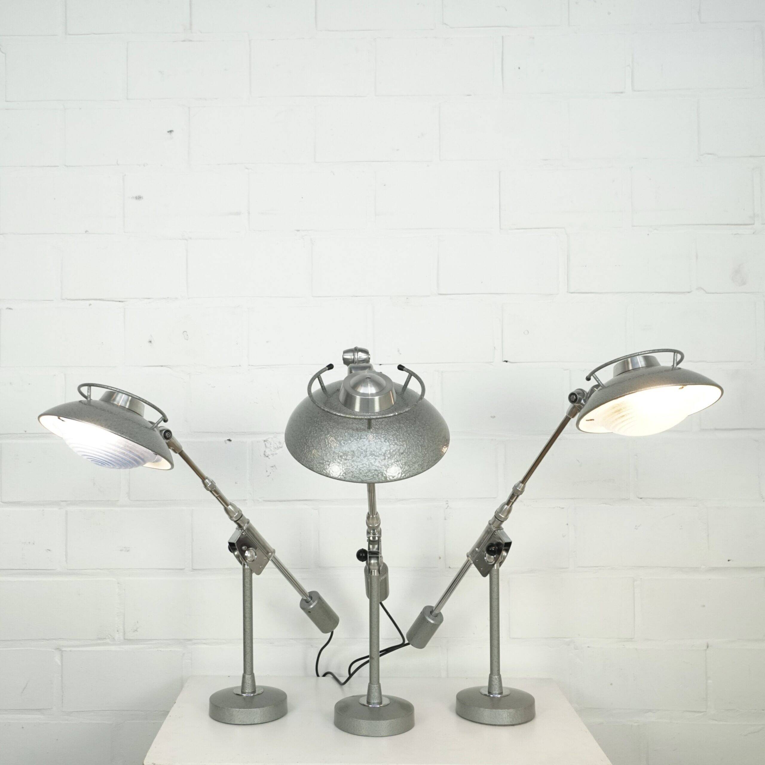 Fully adjustable Ferdinand Solere desk lamps