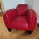 Fauteuil club design contemporain en cuir rouge – pièce sculpturale