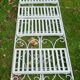 White wrought iron folding shelf