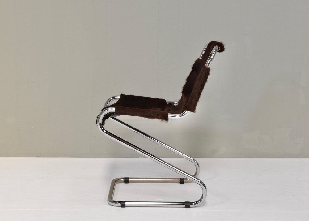 Vintage Italian chair in cowhide and chrome, 1970s