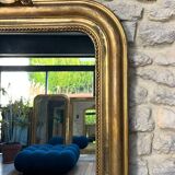 Antique Louis-Philippe mirror with pediment and gilt beading