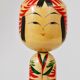Decorative Kokeshi doll sculpture from northern Japan, hand-painted, signed.