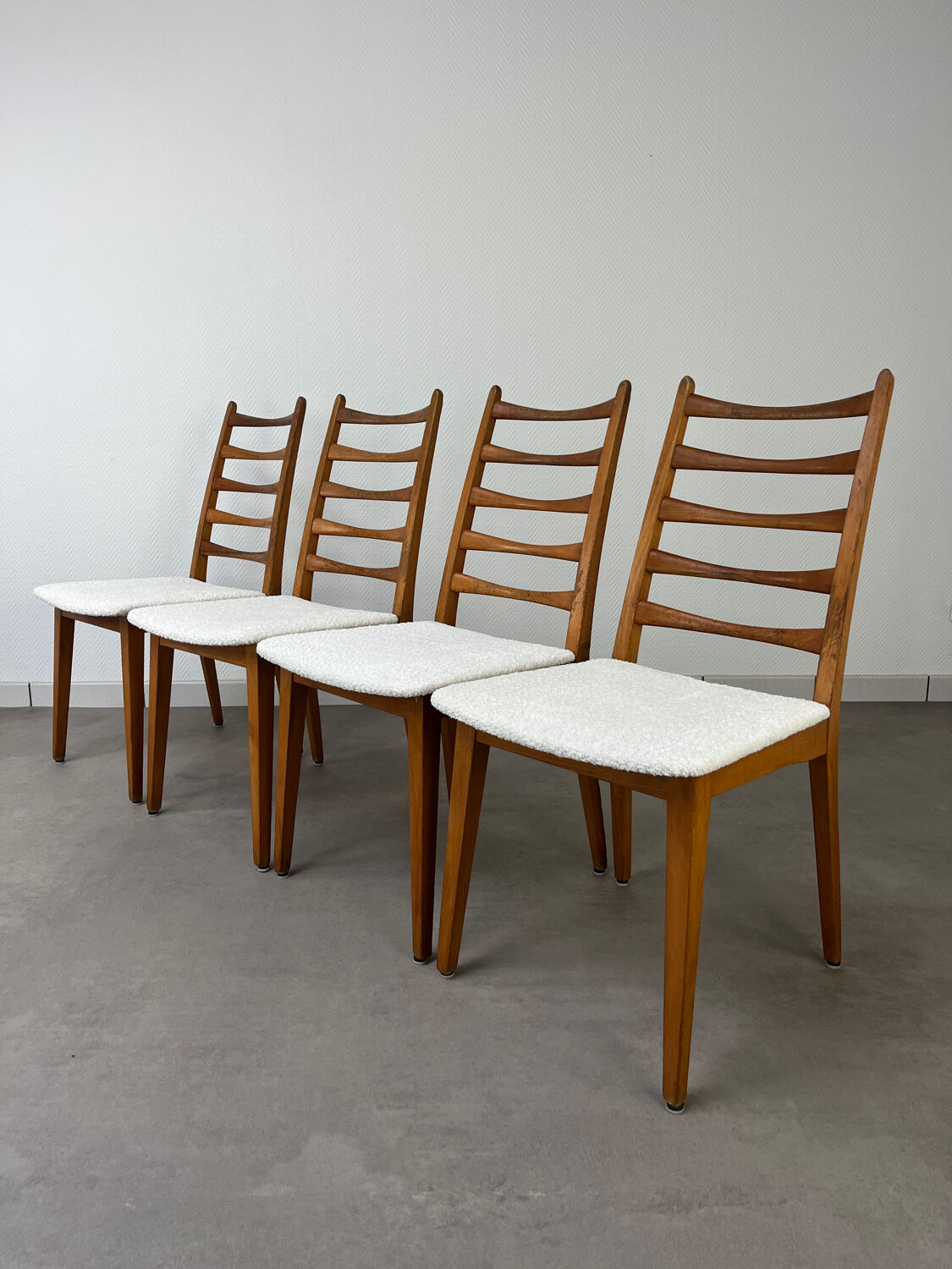 4 Scandinavian chairs, teak with boucle seats.