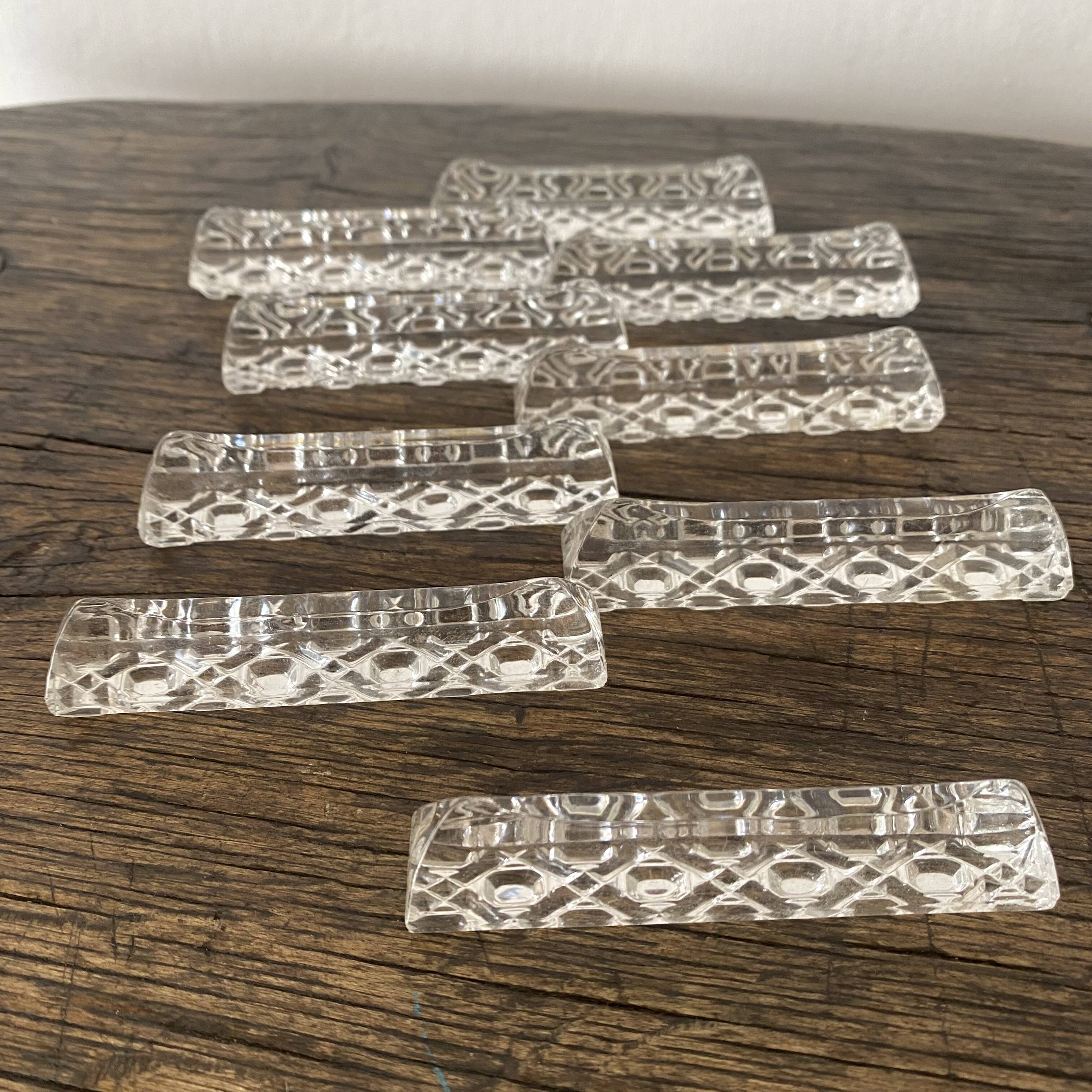 Set of antique glass knife holders