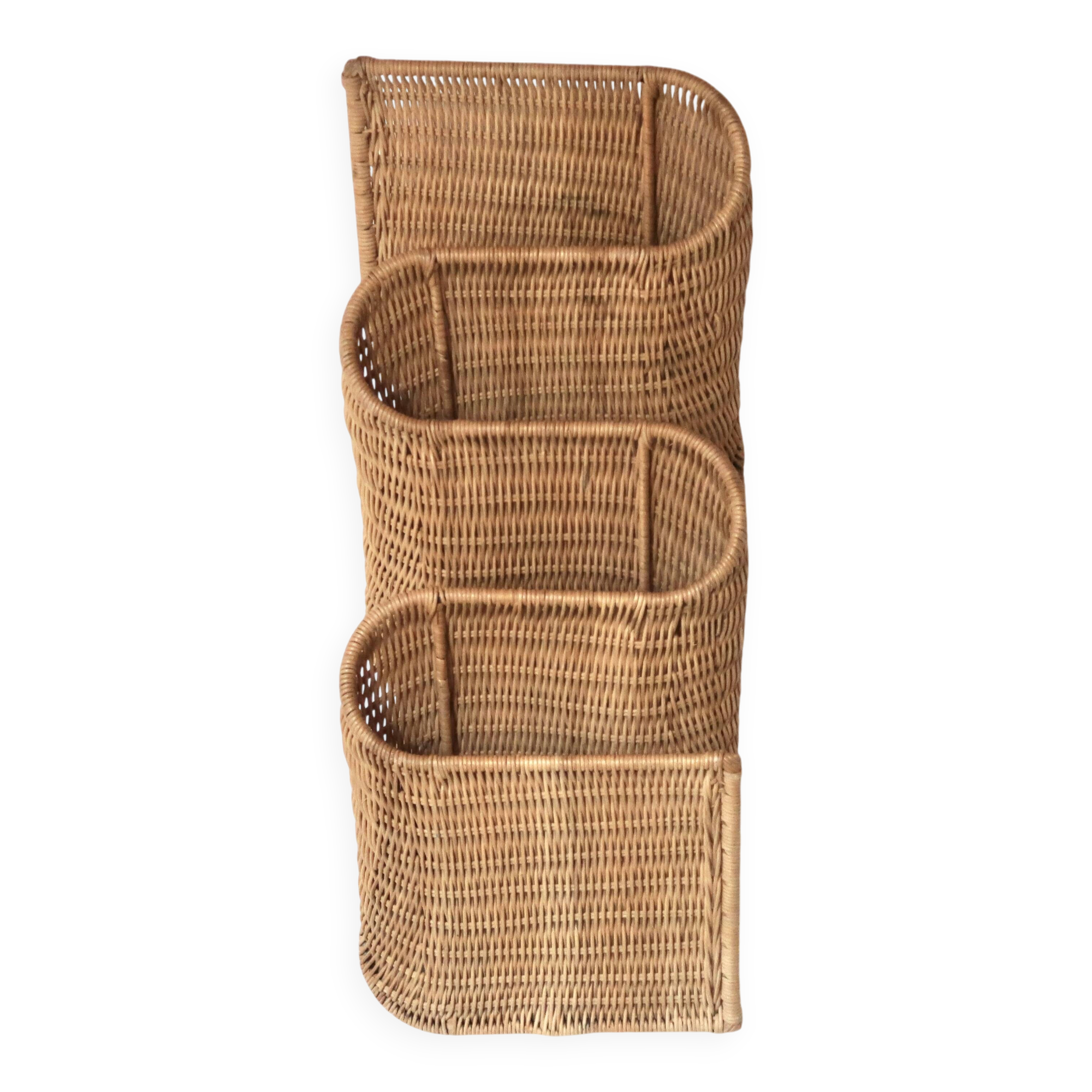 Wall-mounted magazine rack TIBY in rattan wicker by Karl Malmvall for Ikea from the 90s.