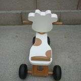 Wooden trotter carrier cow