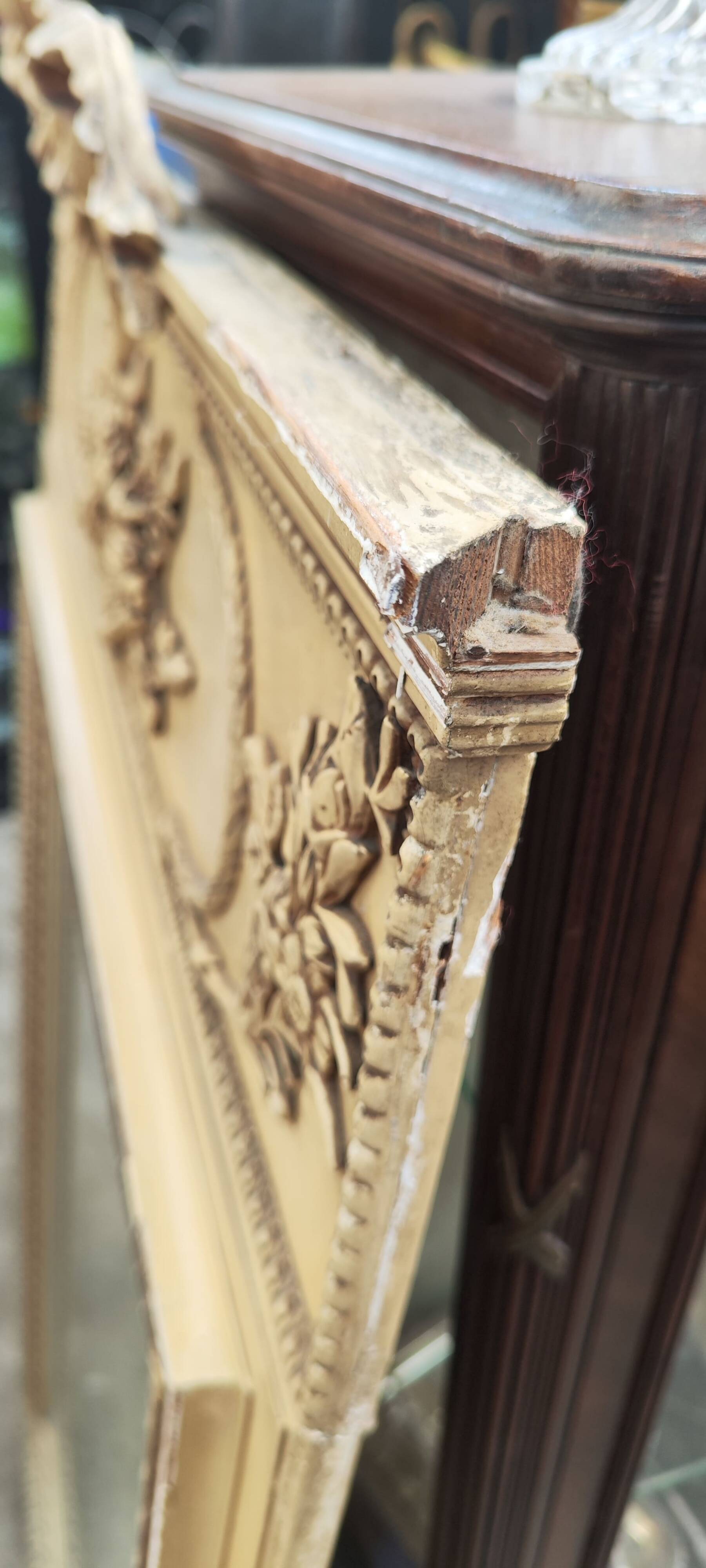 Old large Louis XVI style trumeau mirror with pediment and floral basket knot