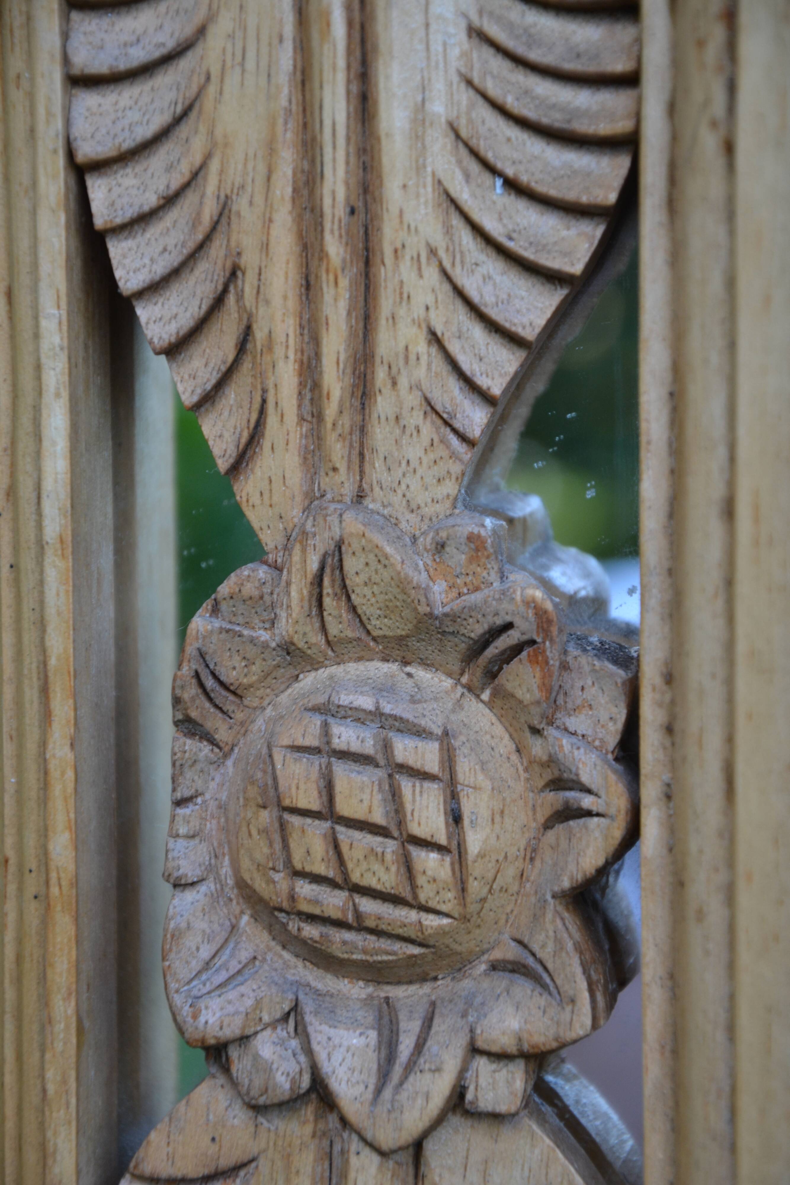 Large carved wooden mirror