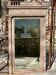 Imposing fireplace mirror in carved and painted wood, 19th century.