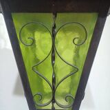 Wrought iron and green glass lantern