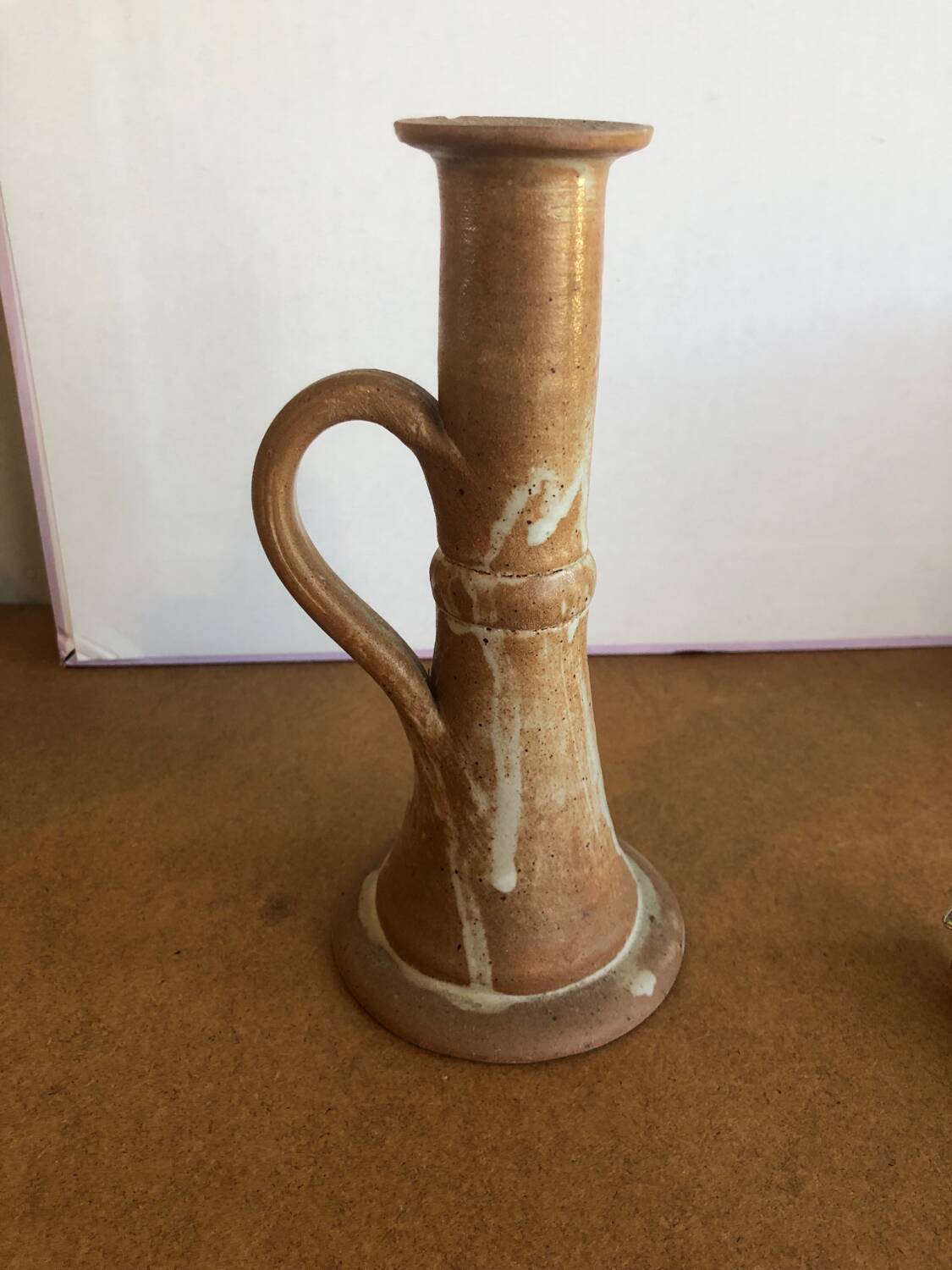 Pretty sandstone candle holder with handle