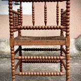 Antique Bobbin armchair with straw seat