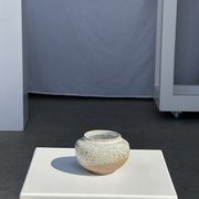 Small white ball vase tight neck in glazed speckled ceramic