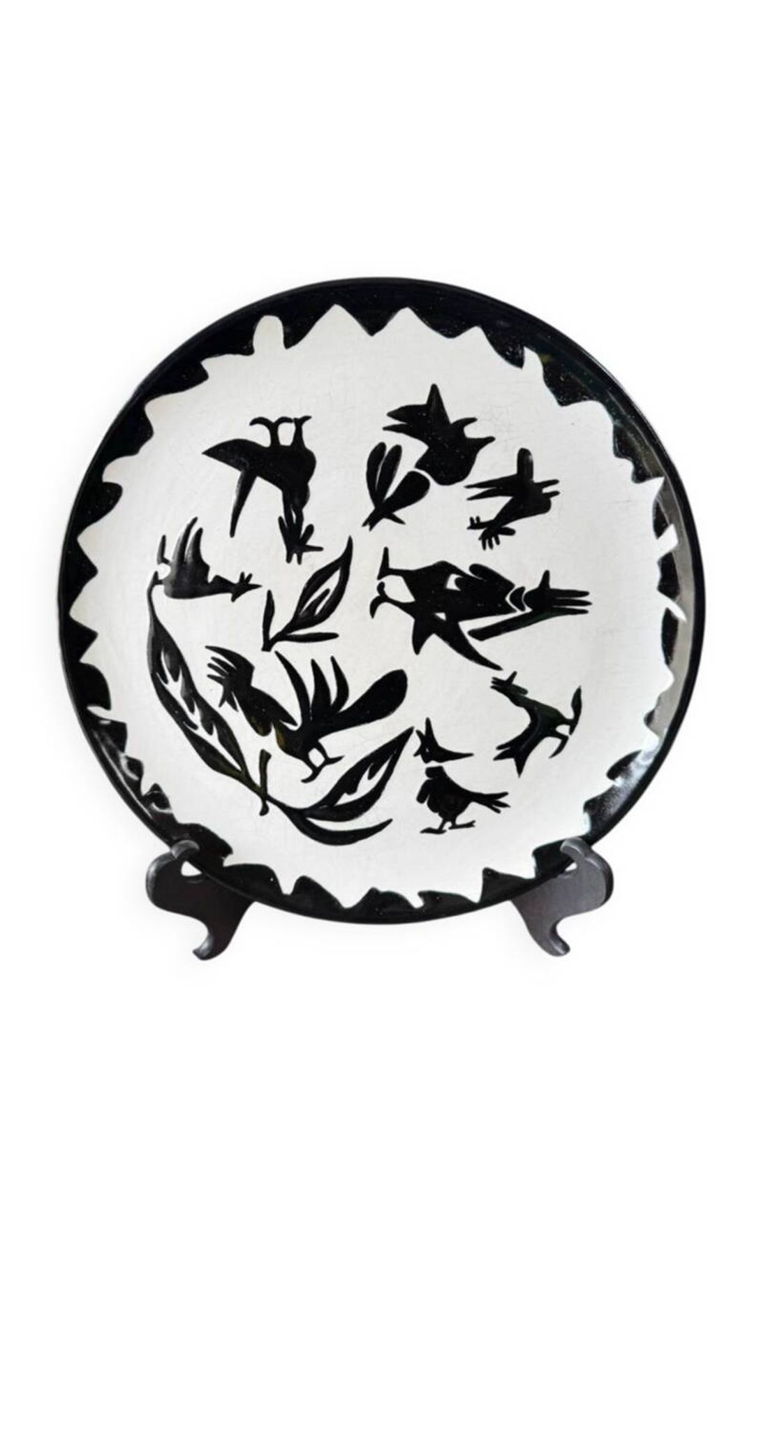 Terracotta plate, Jean Lurçat decorated with a rooster and foliage.
