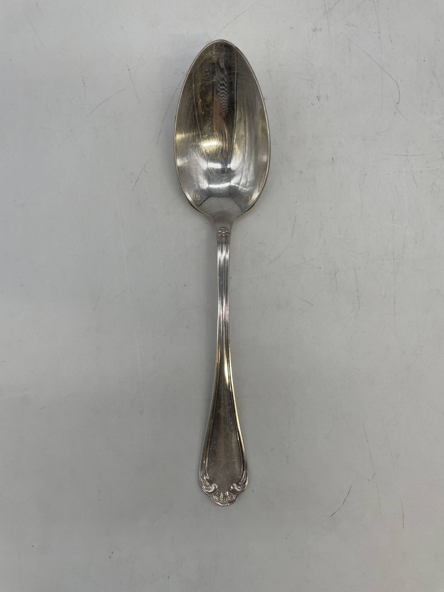 Set of 12 silver-plated soup spoons with Louis XV pattern.