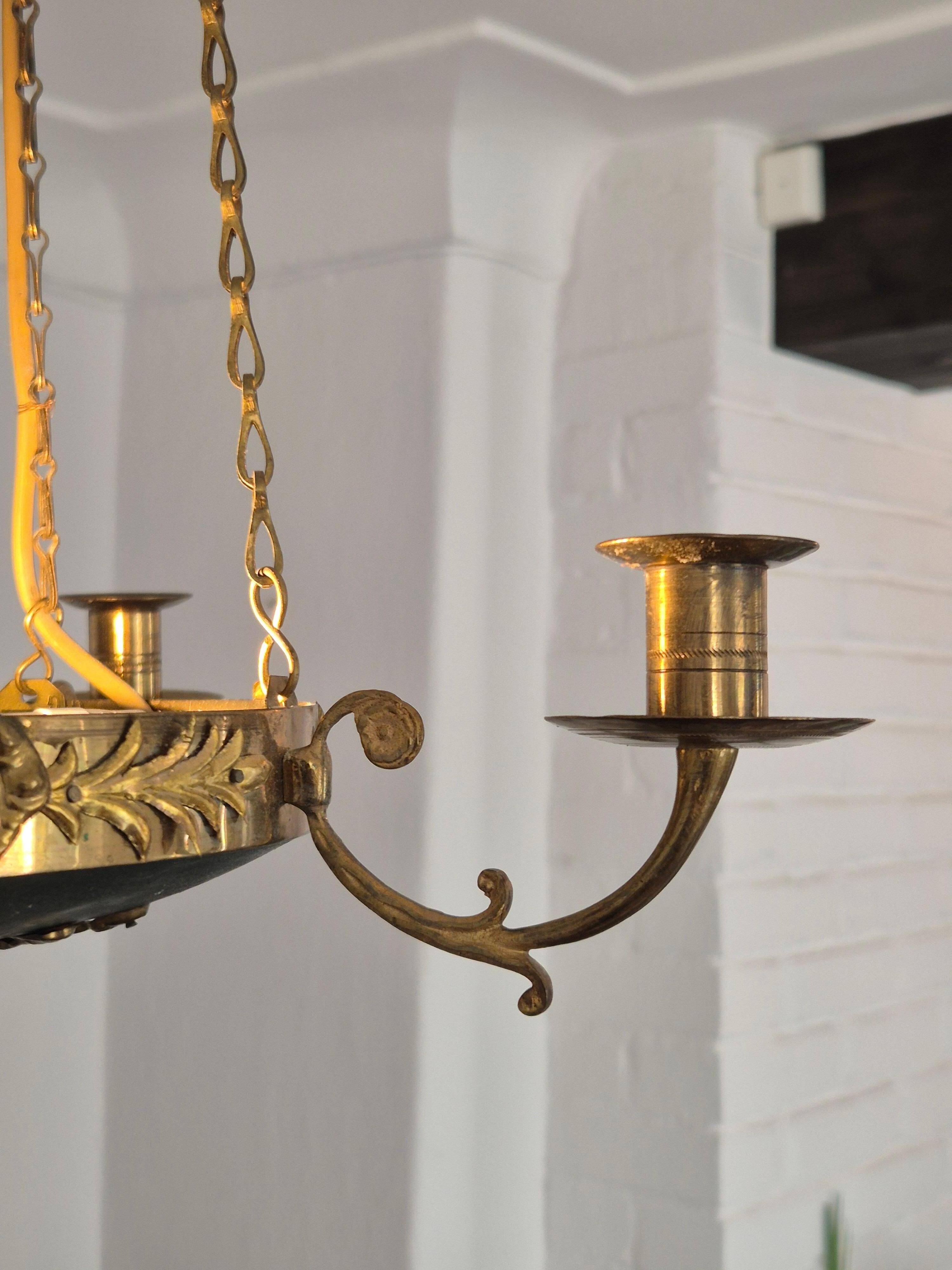 Pendant in brass with two light sockets and four candle holders, Empire style