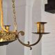 Pendant in brass with two light sockets and four candle holders, Empire style
