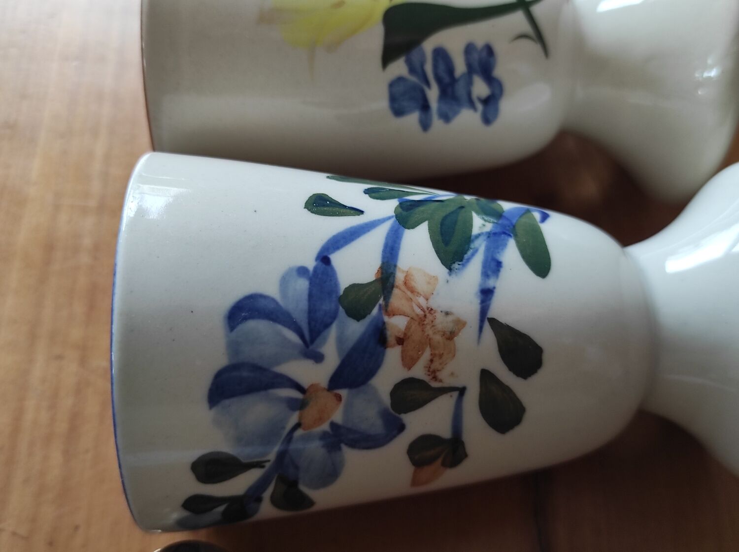 Set of 3 hand-painted Chinese ceramic Mazagrans with floral decoration.