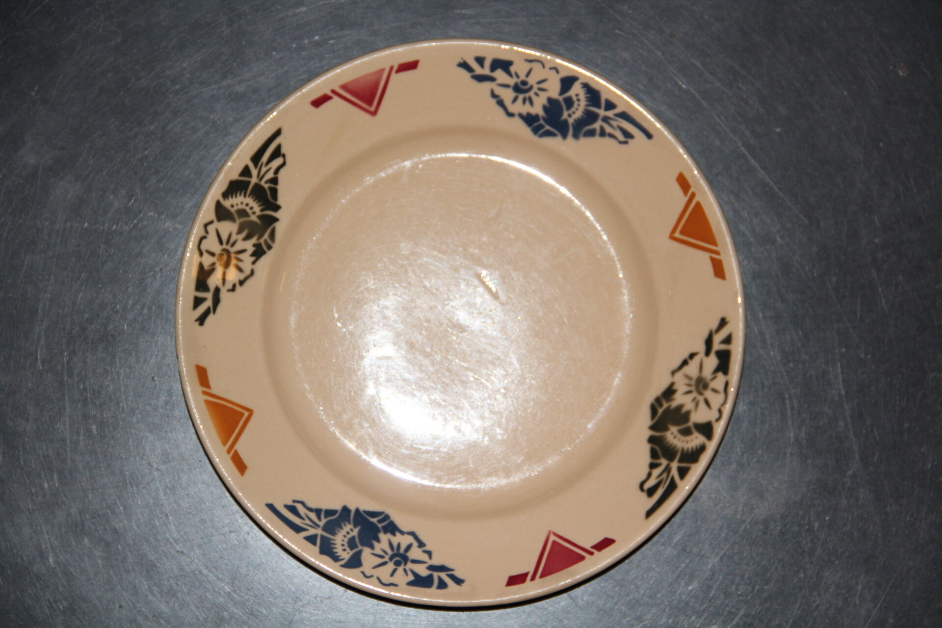 Old dessert plate in earthenware