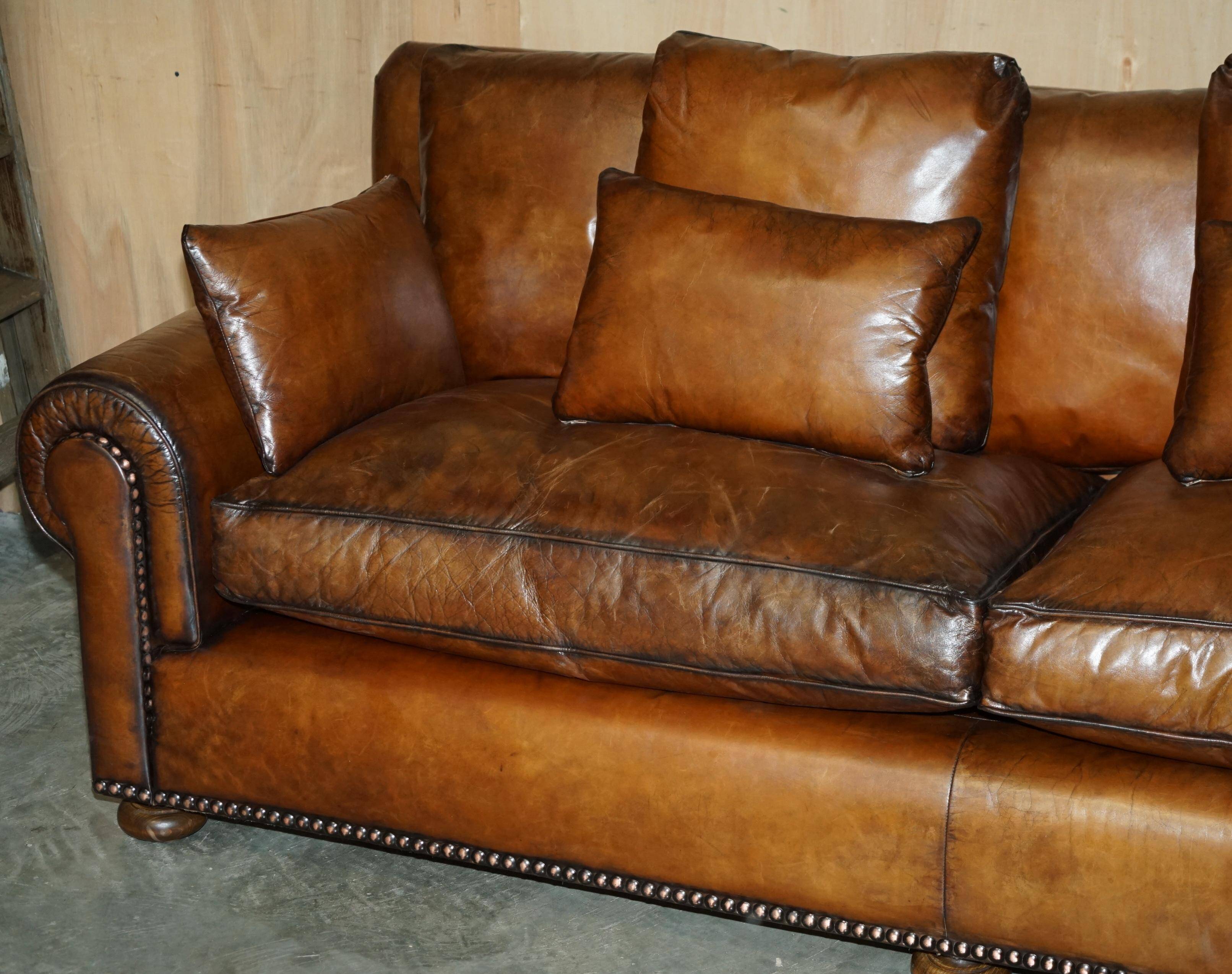 Pair of Ralph Lauren Jamaica club sofas restored in leather.