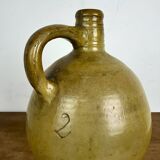 Antique glazed earthenware jug