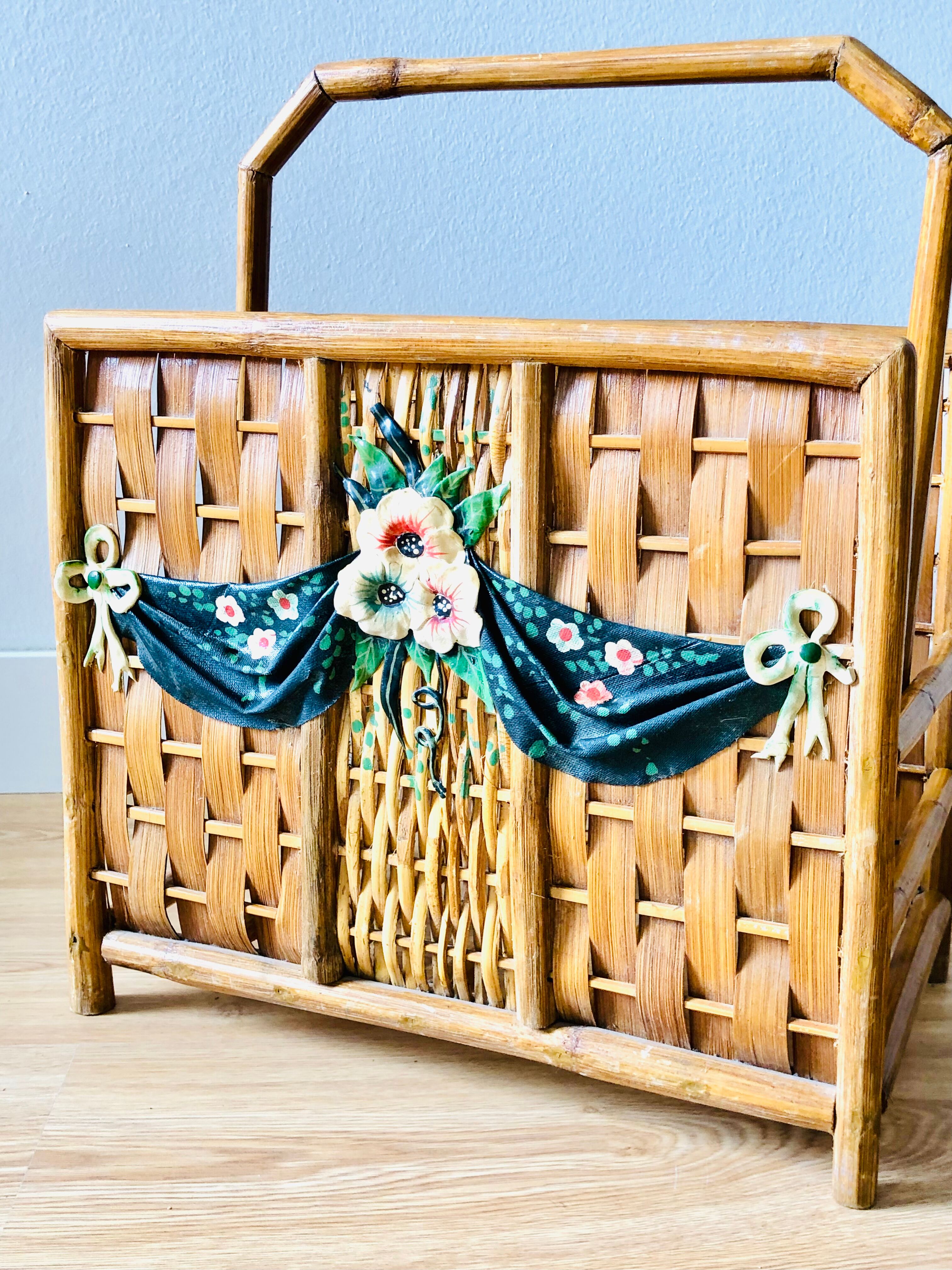 Vintage rattan magazine holder with floral decoration