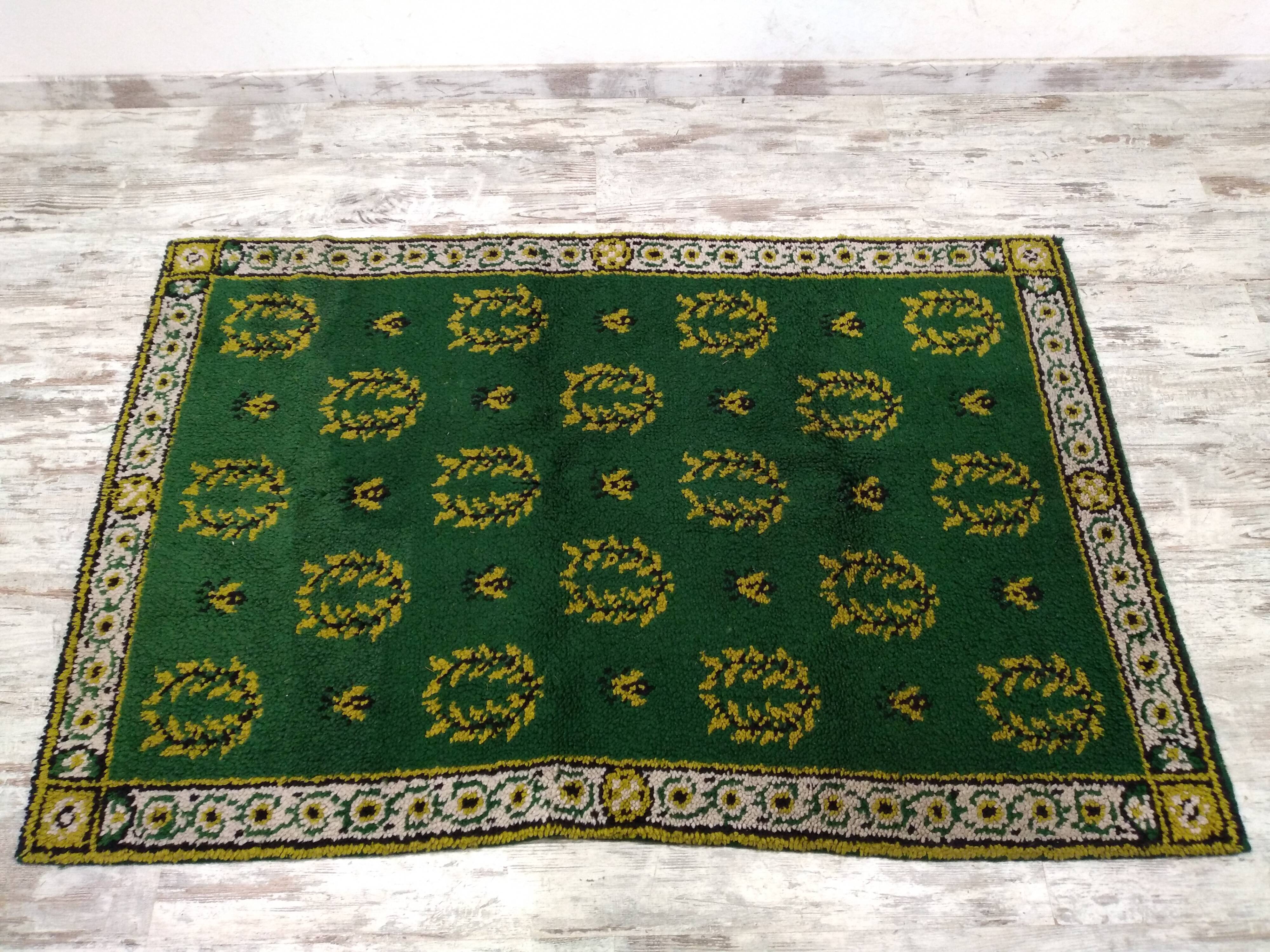 Antique green Berber rug