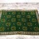 Antique green Berber rug
