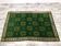 Antique green Berber rug