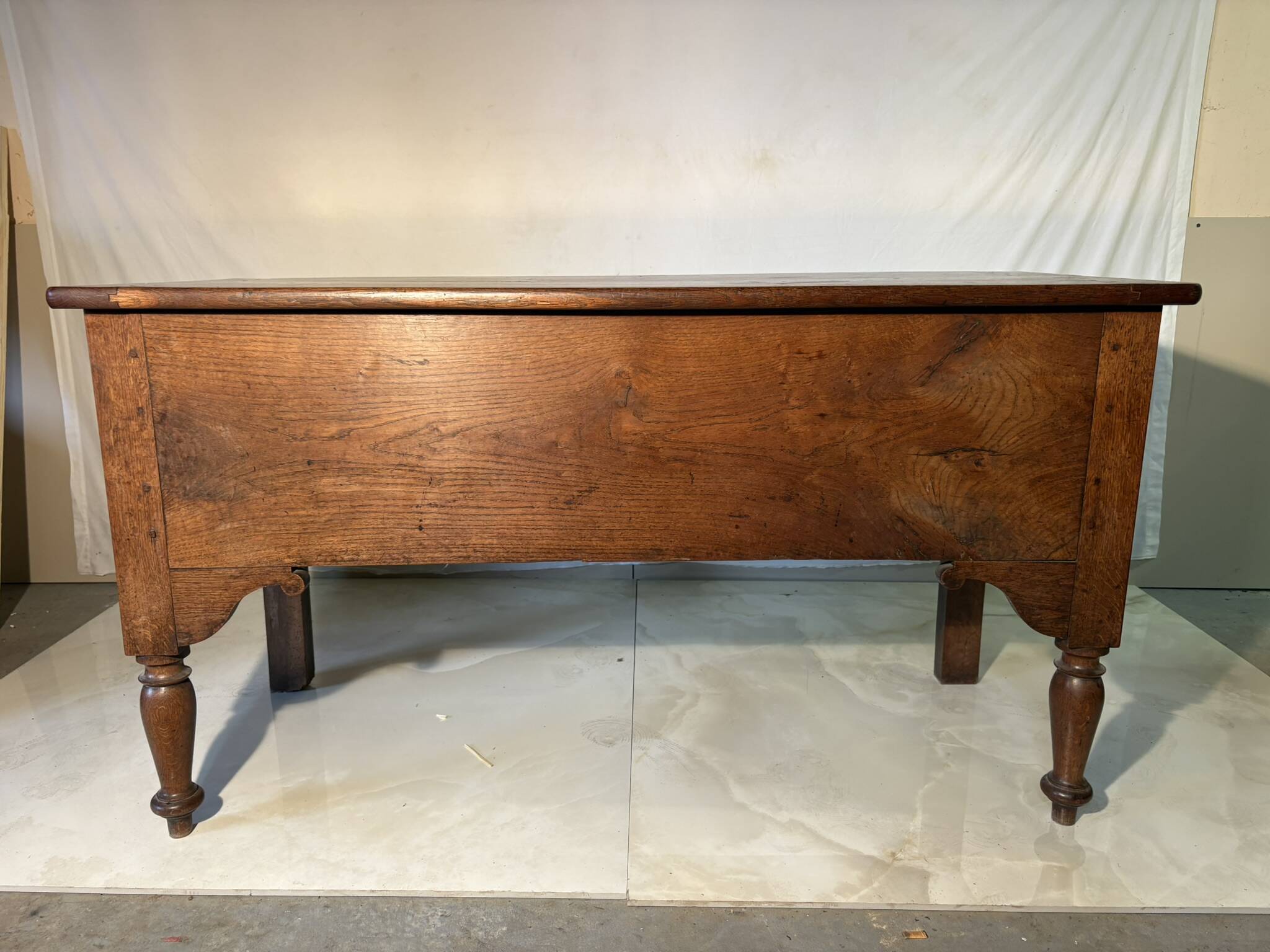 Large antique oak chest with turned legs