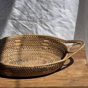 Large flat oval woven rattan basket with handles, Indonesian L53x64