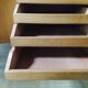 Vintage storage unit with two doors and four drawers.
