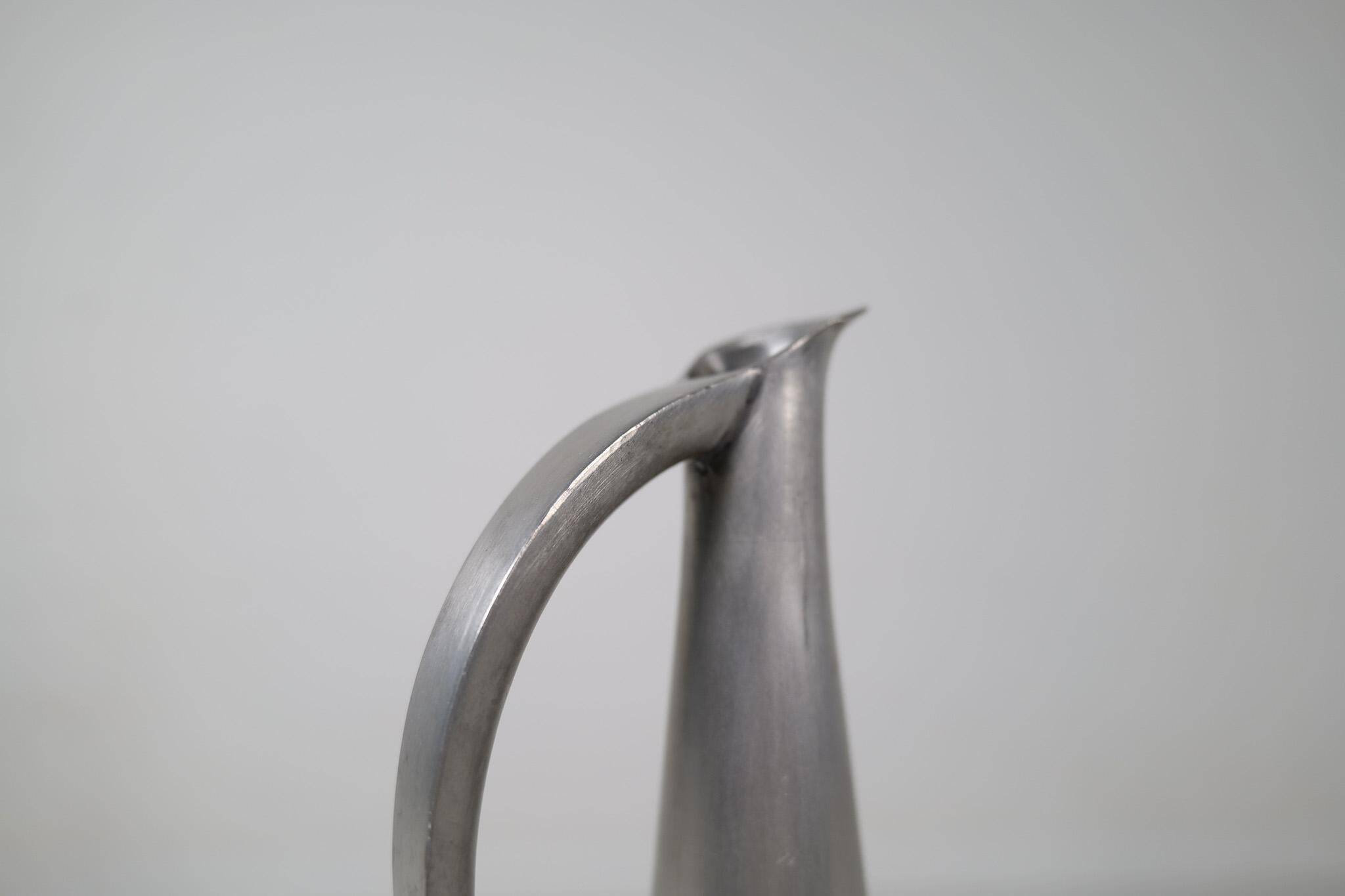 Sculptural Art Deco wine pitcher "Jomfruen" in pewter by Gunnar Havstad 1930s