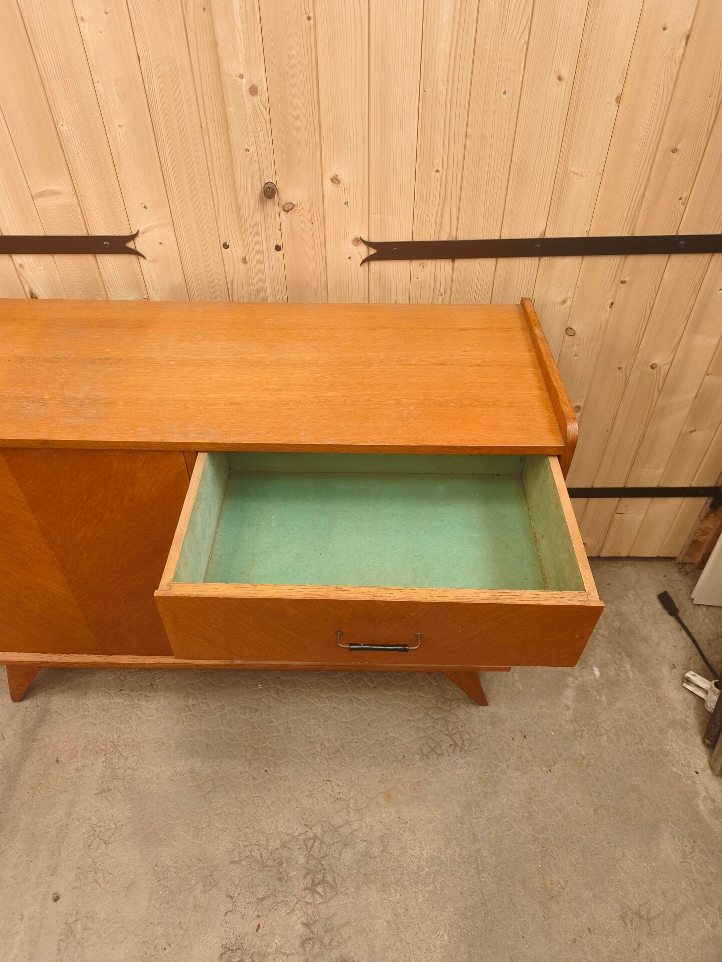 Vintage Scandinavian buffet with tapered legs.