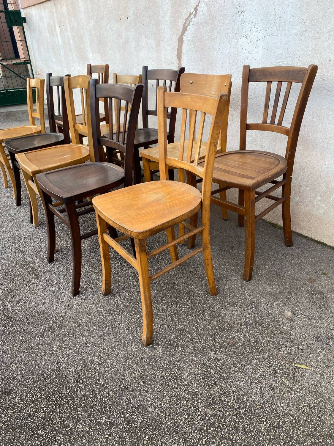 Set of 10 mismatched bistro chairs