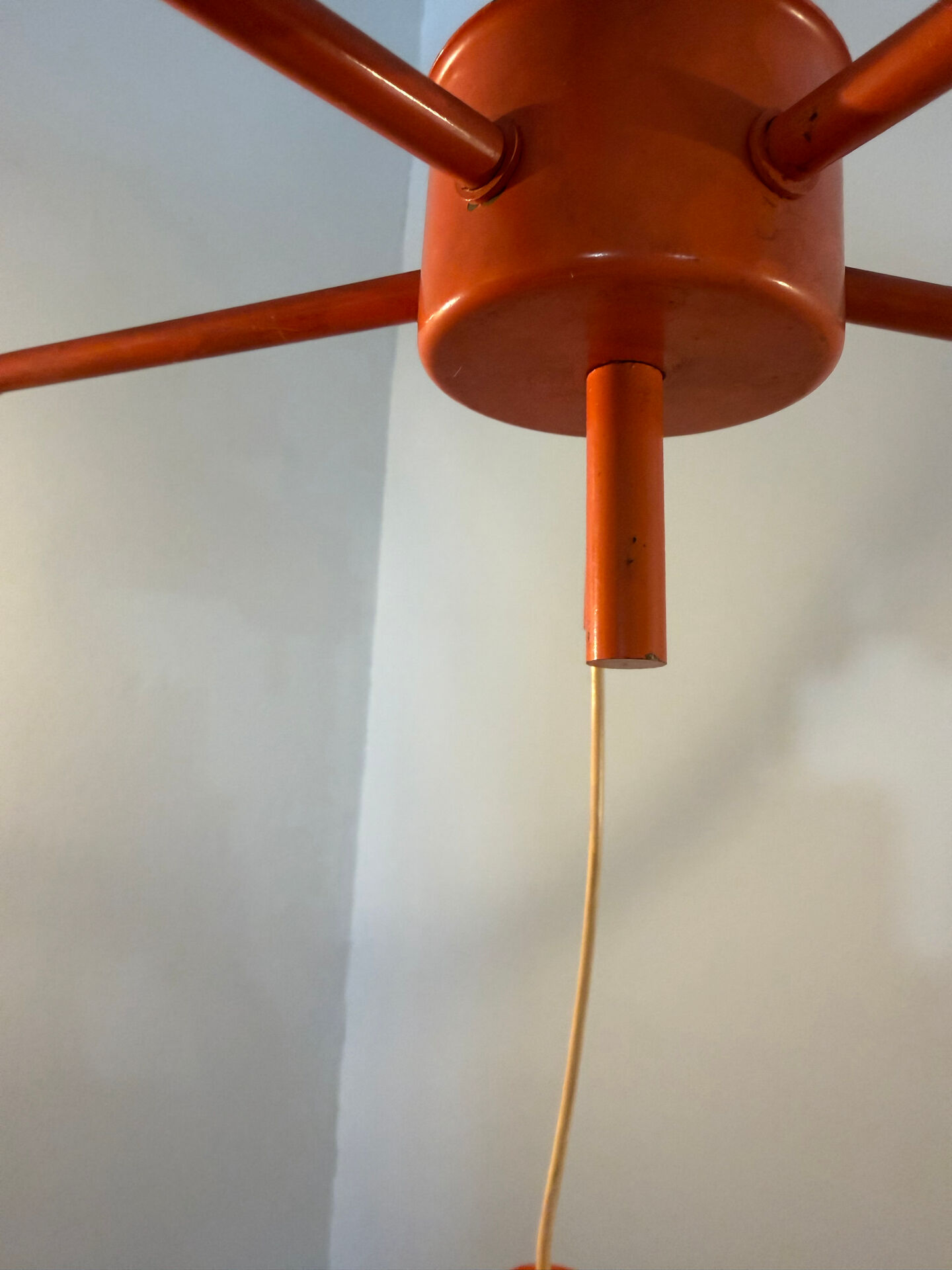 Suspension cascade design Space age orange vintage from the 70s.