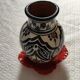 small ceramic vase