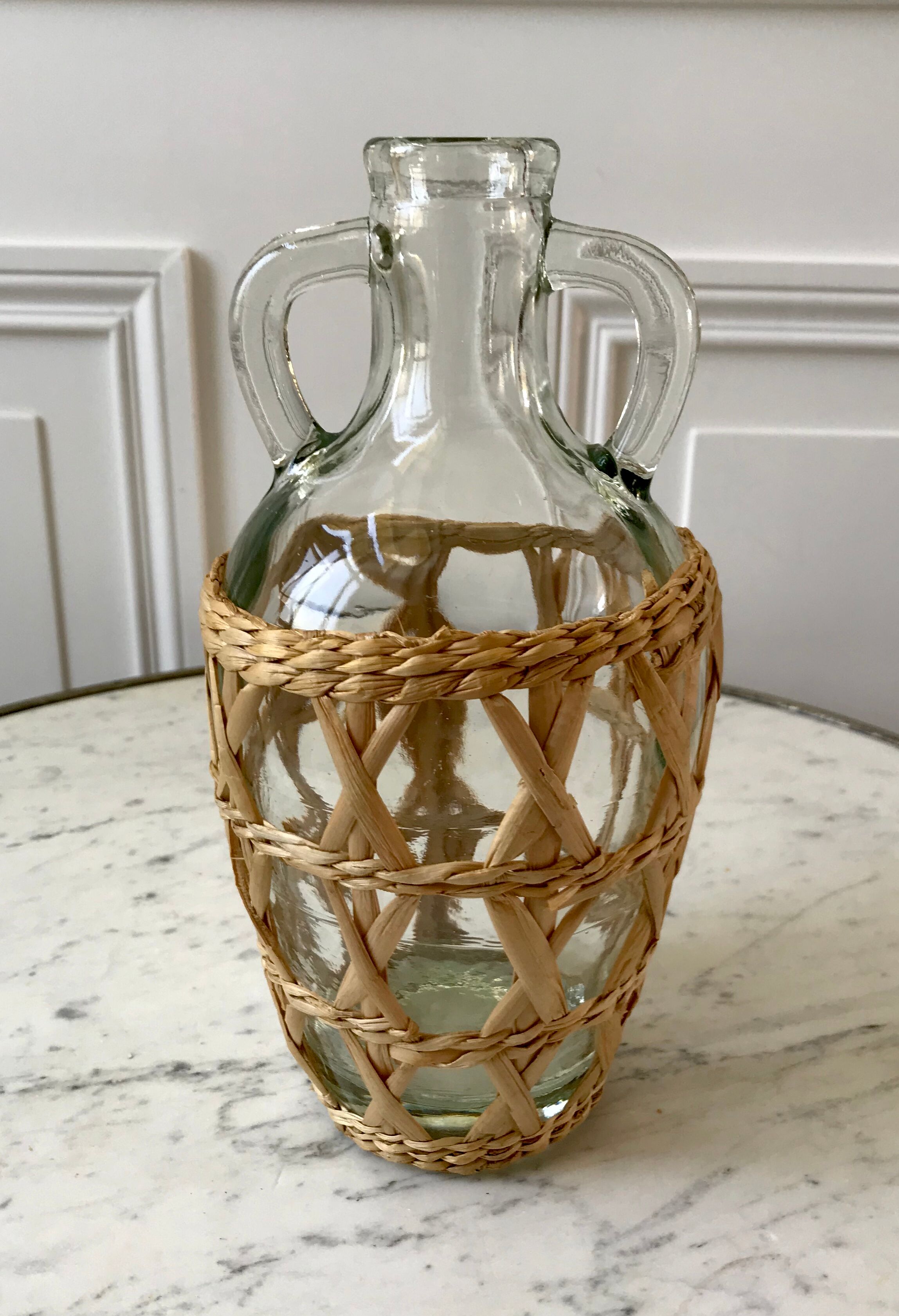 Bottle with handle and covered with wicker / rattan 70s