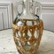 Bottle with handle and covered with wicker / rattan 70s