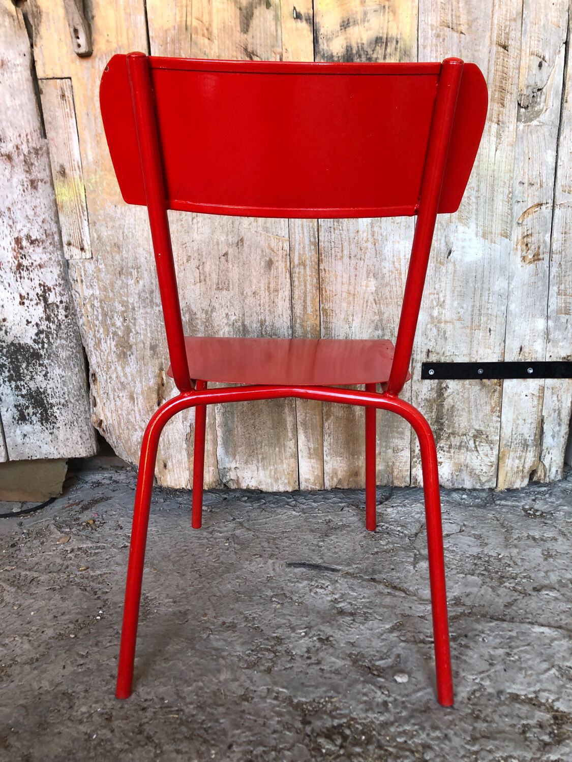 Set of 4 red metal chairs